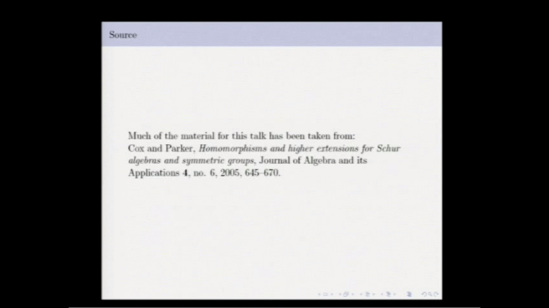 Homomorphisms and higher extensions for Schur algebras and symmetric groups Thumbnail